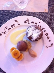 Pudding, with 'Happy Anniversary' written on plate